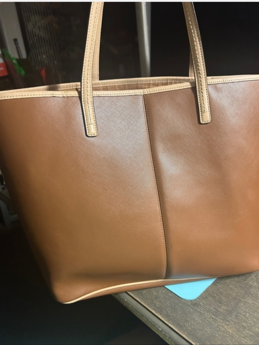 Coach Metro Tote, Saddle color, featuring the brand's iconic horse and carriage